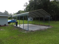 Do I need a building permit to construct a metal carport in Florida?