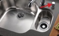 What is a high drain loop or air gap in a dishwasher drain hose?