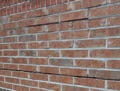 What would cause long horizontal lines of brick mortar to fall out?