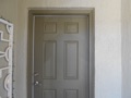 What is the average life expectancy of a fiberglass exterior door?
