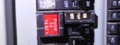 Why type of circuit breaker has a red test button?