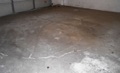 What causes a garage floor to crack?