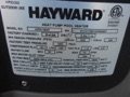How do I determine the age of a Hayward pool heater from the serial number?