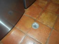 Why is there a floor drain in the laundry room?
