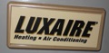 What size in tons is a Luxaire air conditioner or heat pump from the model number?