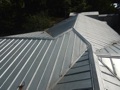 What is the code required minimum pitch/slope for a metal roof?