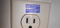 When are the GFCI PROTECTED and NO EQUIPMENT GROUND stickers required on receptacle outlets?