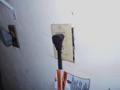 What is the maximum gap allowed around a receptacle outlet box in a wall?