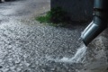Can heavy rain cause a septic tank back up?