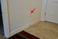 Does code require receptacle on wall behind door swing?