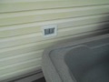 How far away does a receptacle outlet have to be from a plug-and-play spa/hot tub per code?