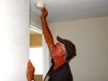 Where should smoke alarms NOT be installed?