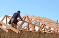What is the average life expectancy of wood roof trusses?