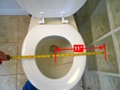 What are the minimum clearances around a toilet?