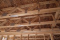 What is the average life expectancy of wood floor trusses?